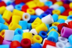 Compaction Granulation and Polymer Products - Image of multi-colored plastic components